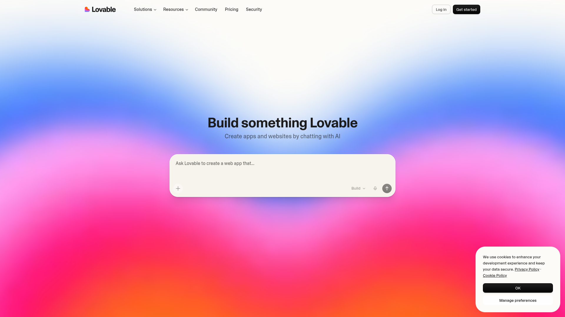 Lovable landing page with the headline 'Build something Lovable' over a pink-and-blue gradient, the subtitle 'Create apps and websites by chatting with AI', and a central prompt input reading 'Ask Lovable to create a web app that…'.
