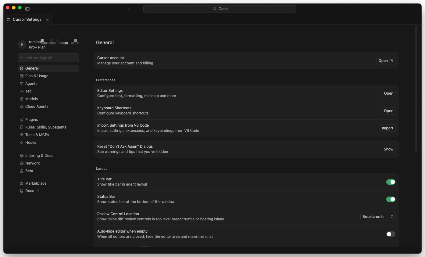 Cursor settings window showing the General tab with options for theme, editor font, AI model preferences, and account status.